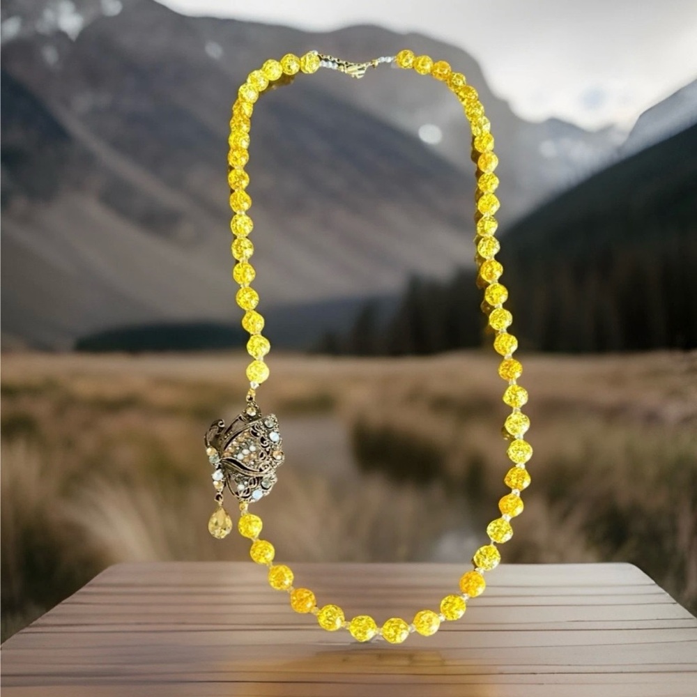 Elegant Yellow Beaded Necklace with Silver Charm